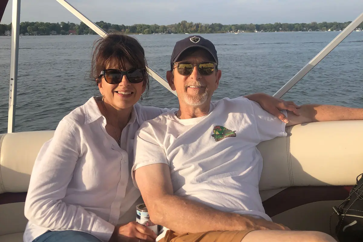 Owner, Pamela, with her husband boating in Colorado